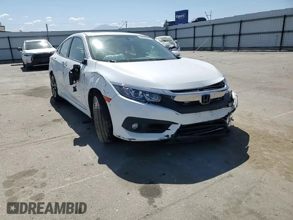2018 Honda Civic EX-L z VIN JHMFC1F77JX016165, wystawiony jako Copart lot #56885445 z przebiegiem Nie podano mil oraz Szkoda całkowita • Salvage title. Historia ofert i sprzedaży dostępna na DreamBid. Obrazek 13.