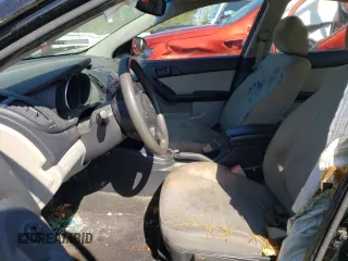 2010 Kia Forte EX z VIN KNAFU4A26A5861366, wystawiony jako Copart lot #51791605 z przebiegiem 161 093 mil mil oraz Szkoda całkowita • Salvage title. Historia ofert i sprzedaży dostępna na DreamBid. Obrazek 7.