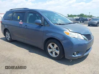 2015 Toyota Sienna LE AAS with VIN 5TDKK3DC1FS642029, listed as a IAAI auction lot 42618738 with 201,344 mi miles and . Bid and sale history available at DreamBid. Image 1.