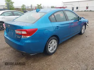 2017 Subaru Impreza Premium z VIN 4S3GKAB68H3610559, wystawiony jako IAAI lot #42156102 z przebiegiem 79 548 mil mil oraz . Historia ofert i sprzedaży dostępna na DreamBid. Obrazek 4.