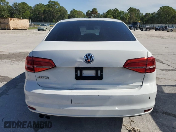 2015 Volkswagen Jetta S with VIN 3VW2K7AJ9FM323047, listed as a Copart auction lot 59098565 with 169,648 mi miles and Salvage title. Bid and sale history available at DreamBid. Image 6.