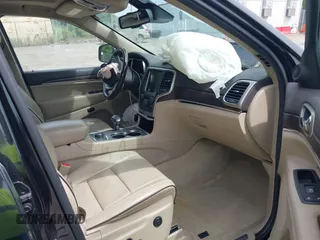 2015 Jeep Grand Cherokee Overland z VIN 1C4RJFCG3FC753772, wystawiony jako IAAI lot #42357411 z przebiegiem 130 970 mil mil oraz . Historia ofert i sprzedaży dostępna na DreamBid. Obrazek 5.