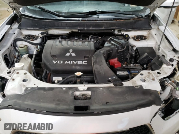 2012 Mitsubishi Outlander GT z VIN JA4JT5AX5CU003648, wystawiony jako Copart lot #48328185 z przebiegiem 223 513 mil mil oraz Czysty tytuł • Clean title. Historia ofert i sprzedaży dostępna na DreamBid. Obrazek 12.