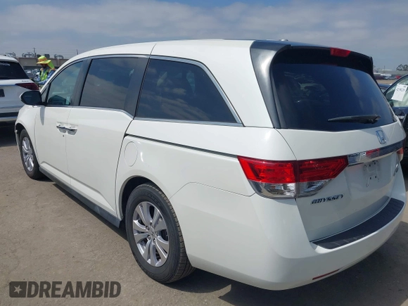 2016 Honda Odyssey SE with VIN 5FNRL5H33GB043303, listed as a IAAI auction lot 42215233 with 67,097 mi miles and . Bid and sale history available at DreamBid. Image 3.