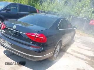 2016 Volkswagen Passat S with VIN 1VWAS7A36GC040993, listed as a IAAI auction lot 40010088 with 105,400 mi miles and . Bid and sale history available at DreamBid. Image 4.