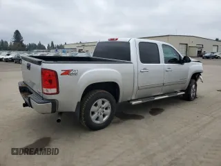 2013 GMC Sierra 1500 SLT with VIN 3GTP2WE75DG275821, listed as a Copart auction lot 43206415 with 141,117 mi miles and Salvage title. Bid and sale history available at DreamBid. Image 3.