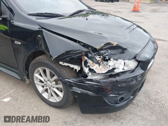 2015 Mitsubishi Lancer ES z VIN JA32U2FU9FU002350, wystawiony jako IAAI lot #40054160 z przebiegiem 120 980 mil mil oraz . Historia ofert i sprzedaży dostępna na DreamBid. Obrazek 6.
