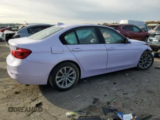 2018 BMW 3 Series 320i with VIN WBA8A9C55JAH12818, listed as a Copart auction lot 52110515 with 72,522 mi miles and Salvage title. Bid and sale history available at DreamBid. Image 3.