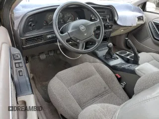 1991 Ford Thunderbird with VIN 1FAPP64R3MH164460, listed as a Copart auction lot 43114305 with 86,771 mi miles and Salvage Title. Bid and sale history available at DreamBid. Image 8.