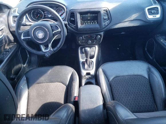 2018 Jeep Compass Latitude with VIN 3C4NJDBB1JT259366, listed as a Copart auction lot 48761085 with 56,190 mi miles and Salvage Title. Bid and sale history available at DreamBid. Image 8.