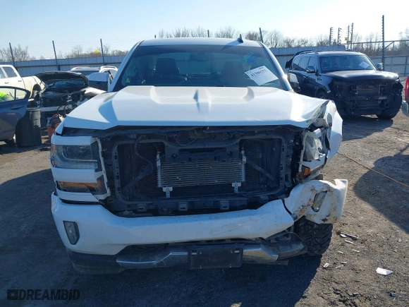 2016 Chevrolet Silverado 1500 LT with VIN 3GCUKREC6GG306239, listed as a IAAI auction lot 41380251 with 128,042 mi miles. Bid and sale history available at carsss.com. Image 13.