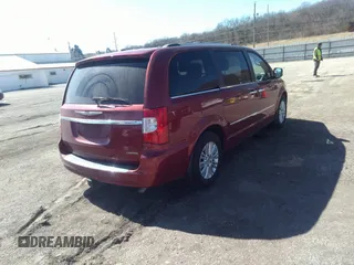 2014 Chrysler Town & Country Limited with VIN 2C4RC1GG5ER463952, listed as a IAAI auction lot 41825303 with 150,131 mi miles and . Bid and sale history available at DreamBid. Image 4.