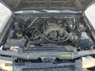 2000 Nissan Frontier XE with VIN 1N6ED27T3YC348002, listed as a Copart auction lot 54538235 with 289,922 mi miles and Salvage title. Bid and sale history available at DreamBid. Image 11.