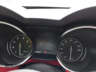 2019 Alfa Romeo Stelvio Ti z VIN ZASPAKBNXK7C31621, wystawiony jako IAAI lot #41773366 z przebiegiem 37 344 mil mil oraz . Historia ofert i sprzedaży dostępna na DreamBid. Obrazek 7.