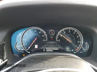 2019 BMW 7 Series 740i xDrive z VIN WBA7E4C50KGV28241, wystawiony jako Copart lot #87329774 z przebiegiem Nie podano mil oraz Szkoda całkowita • Salvage title. Historia ofert i sprzedaży dostępna na DreamBid. Obrazek 9.