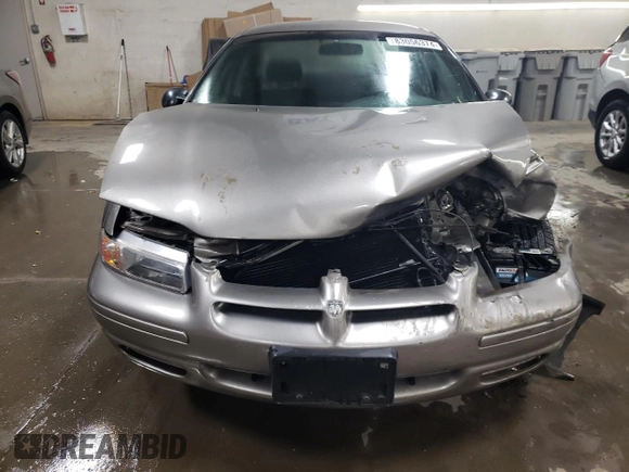 1999 Dodge Stratus z VIN 1B3EJ46X0XN690121, wystawiony jako Copart lot #83056374 z przebiegiem Nie podano mil oraz Szkoda całkowita • Salvage title. Historia ofert i sprzedaży dostępna na DreamBid. Obrazek 5.