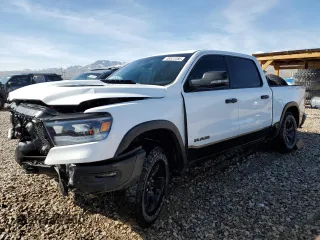 2023 Ram 1500 Rebel with VIN 1C6SRFLT2PN570058, listed as a Copart auction lot 48521285 with 31,605 mi miles and Salvage title. Bid and sale history available at DreamBid. Image 1.