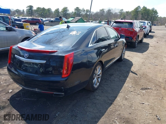 2014 Cadillac XTS Luxury with VIN 2G61M5S3XE9202454, listed as a IAAI auction lot 42025883 with 93,977 mi miles and . Bid and sale history available at DreamBid. Image 4.