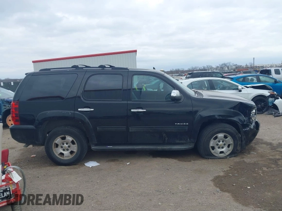 2012 Chevrolet Tahoe LS z VIN 1GNSCAE06CR177058, wystawiony jako IAAI lot #41168492 z przebiegiem 155 819 mil mil oraz . Historia ofert i sprzedaży dostępna na DreamBid. Obrazek 13.