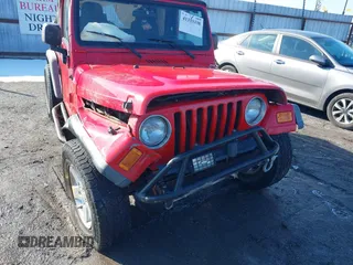 2005 Jeep Wrangler X with VIN 1J4FA39S95P385581, listed as a IAAI auction lot 41333338 with 150,010 mi miles and . Bid and sale history available at DreamBid. Image 6.