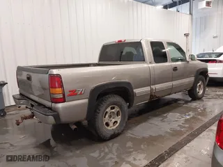 1999 Chevrolet Silverado 1500 LT with VIN 2GCEK19T8X1163660, listed as a IAAI auction lot 41758994 with 227,494 mi miles. Bid and sale history available at carsss.com. Image 4.