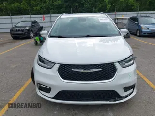 2022 Chrysler Pacifica Touring L with VIN 2C4RC1BG3NR149675, listed as a IAAI auction lot 42470593 with 59,956 mi miles and . Bid and sale history available at DreamBid. Image 12.
