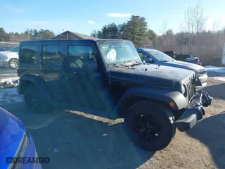 2015 Jeep Wrangler Unlimited Sport with VIN 1C4BJWDG5FL766989, listed as a IAAI auction lot 41342159 with 182,483 mi miles. Bid and sale history available at carsss.com. Image 13.