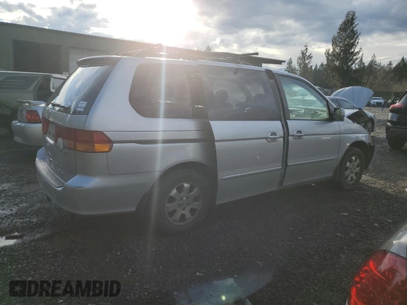 2003 Honda Odyssey EX-L with VIN 5FNRL18913B093284, listed as a Copart auction lot 82364343 with Not Provided miles and Salvage Title. Bid and sale history available at DreamBid. Image 3.