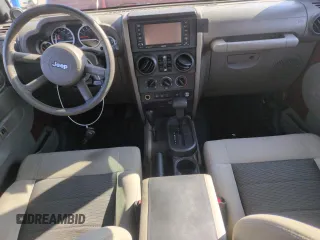 2010 Jeep Wrangler Unlimited Rubicon with VIN 1J4BA6H13AL140902, listed as a Copart auction lot 54335455 with 118,423 mi miles and Clean title. Bid and sale history available at DreamBid. Image 8.