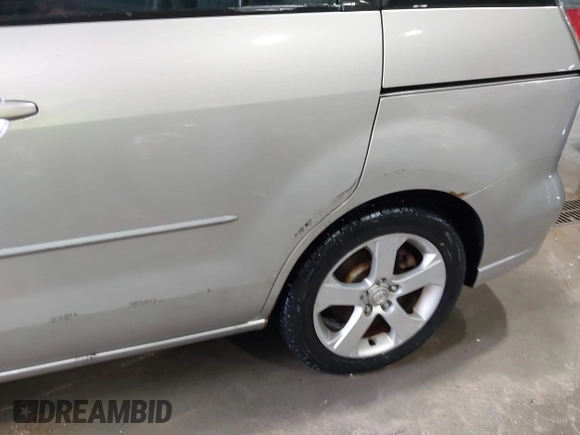2007 Mazda 5 Touring with VIN JM1CR293070139647, listed as a IAAI auction lot 41422258 with 197,842 mi miles and . Bid and sale history available at DreamBid. Image 6.