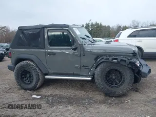 2021 Jeep Wrangler Sport S with VIN 1C4GJXAN9MW768559, listed as a IAAI auction lot 41238254 with 18,191 mi miles and . Bid and sale history available at DreamBid. Image 13.