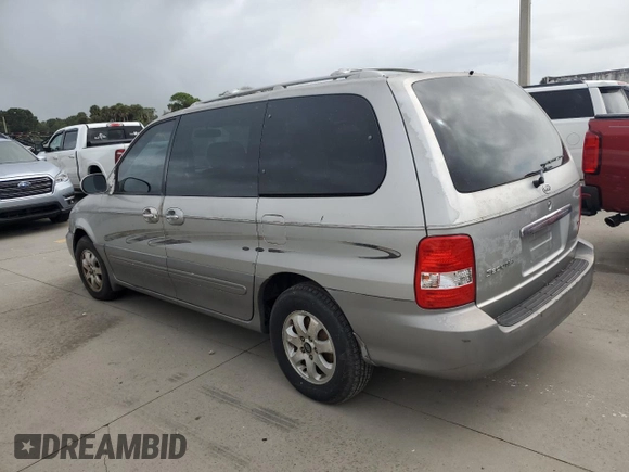 2004 Kia Sedona LX with VIN KNDUP131446570061, listed as a Copart auction lot 74222344 with 0 mi miles and Salvage Title. Bid and sale history available at carsss.com. Image 2.