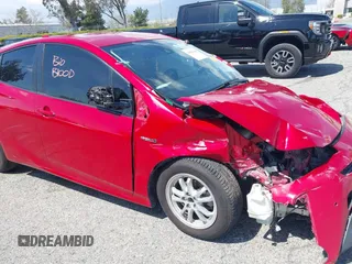 2020 Toyota Prius L Eco z VIN JTDKARFU0L3109596, wystawiony jako IAAI lot #41950366 z przebiegiem Nie podano mil oraz . Historia ofert i sprzedaży dostępna na DreamBid. Obrazek 16.