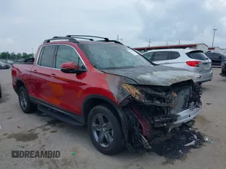 2023 Honda Ridgeline RTL with VIN 5FPYK3F53PB059323, listed as a IAAI auction lot 42485621 with Not provided miles and . Bid and sale history available at DreamBid. Image 1.