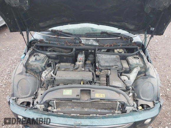 2006 MINI Hardtop with VIN WMWRC33506TK73564, listed as a IAAI auction lot 42602486 with 156,459 mi miles and . Bid and sale history available at DreamBid. Image 10.