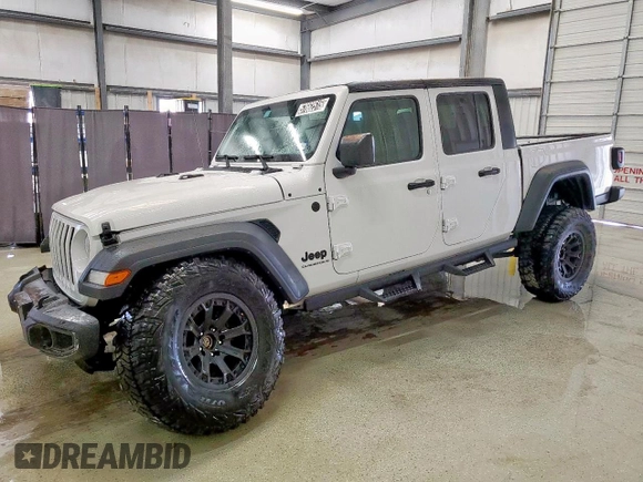 2023 Jeep Gladiator Sport S with VIN 1C6HJTAG1PL542530, listed as a Copart auction lot 60669075 with 44,323 mi miles and Salvage title. Bid and sale history available at DreamBid. Image 2.