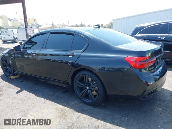 2017 BMW 7 Series 750i with VIN WBA7F0C37HGM22205, listed as a IAAI auction lot 40033800 with 70,581 mi miles. Bid and sale history available at carsss.com. Image 3.