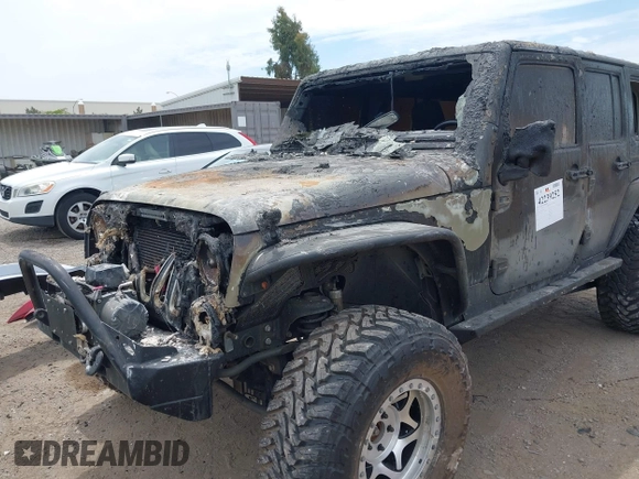 2016 Jeep Wrangler Unlimited Sahara z VIN 1C4HJWEG4GL261147, wystawiony jako IAAI lot #42239252 z przebiegiem 69 604 mil mil oraz . Historia ofert i sprzedaży dostępna na DreamBid. Obrazek 6.