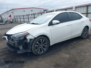 2019 Toyota Corolla L with VIN 5YFBURHE1KP937059, listed as a IAAI auction lot 41901278 with 98,796 mi miles and . Bid and sale history available at DreamBid. Image 2.
