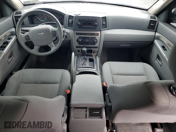 2005 Jeep Grand Cherokee Laredo with VIN 1J4GR48K55C719634, listed as a Copart auction lot 61809195 with 141,316 mi miles and Salvage title. Bid and sale history available at DreamBid. Image 8.