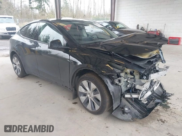 2023 Tesla Model Y Long Range with VIN 7SAYGDEE0PF909610, listed as a IAAI auction lot 41906081 with 20,656 mi miles and . Bid and sale history available at DreamBid. Image 1.