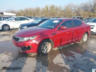 2011 Kia Optima LX with VIN KNAGM4A72B5072570, listed as a IAAI auction lot 41802542 with 188,922 mi miles. Bid and sale history available at carsss.com. Image 2.