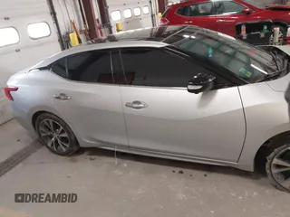 2016 Nissan Maxima SL with VIN 1N4AA6AP6GC384851, listed as a IAAI auction lot 41663659 with 127,247 mi miles and . Bid and sale history available at DreamBid. Image 13.