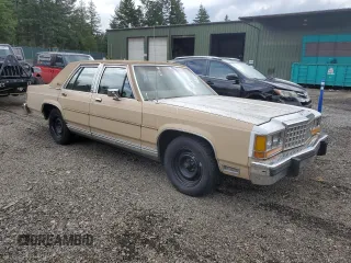 1986 Ford Crown Victoria z VIN 2FABP43F2GX172057, wystawiony jako Copart lot #71609094 z przebiegiem 63 900 mil mil oraz Tytuł czysty. Historia ofert i sprzedaży dostępna na DreamBid. Obrazek 4.