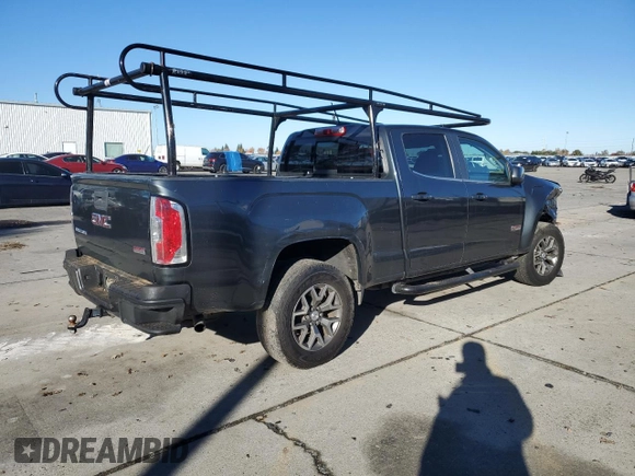 2015 GMC Canyon 2WD SLE with VIN 1GTG5BE38F1240947, listed as a Copart auction lot 82707204 with 63,049 mi miles and Salvage Title. Bid and sale history available at carsss.com. Image 3.