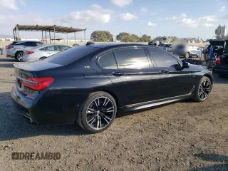 2018 BMW 7 Series M760i xDrive with VIN WBA7H6C50JG614781, listed as a Copart auction lot 83689234 with 49,873 mi miles and Salvage Title. Bid and sale history available at carsss.com. Image 3.