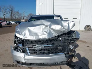 2018 Chevrolet Tahoe Commercial with VIN 1GNSKDEC1JR340887, listed as a IAAI auction lot 41044038 with 99,500 mi miles. Bid and sale history available at carsss.com. Image 12.