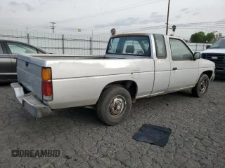 1988 Nissan Hardbody z VIN 1N6ND16S7JC395431, wystawiony jako Copart lot #86765244 z przebiegiem 99 134 mil mil oraz Tytuł czysty. Historia ofert i sprzedaży dostępna na DreamBid. Obrazek 3.
