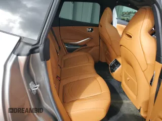 2023 Aston Martin DBX 707 z VIN SD7VUJBW0PTV08298, wystawiony jako Copart lot #77753224 z przebiegiem 3587 mil mil oraz Szkody całkowita. Historia ofert i sprzedaży dostępna na DreamBid. Obrazek 12.