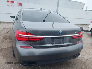 2016 BMW 7 Series 740i with VIN WBA7E2C56GG546920, listed as a IAAI auction lot 41610698 with 119,689 mi miles. Bid and sale history available at carsss.com. Image 16.